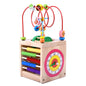 Wooden children's puzzle beetle surrounded by large beads